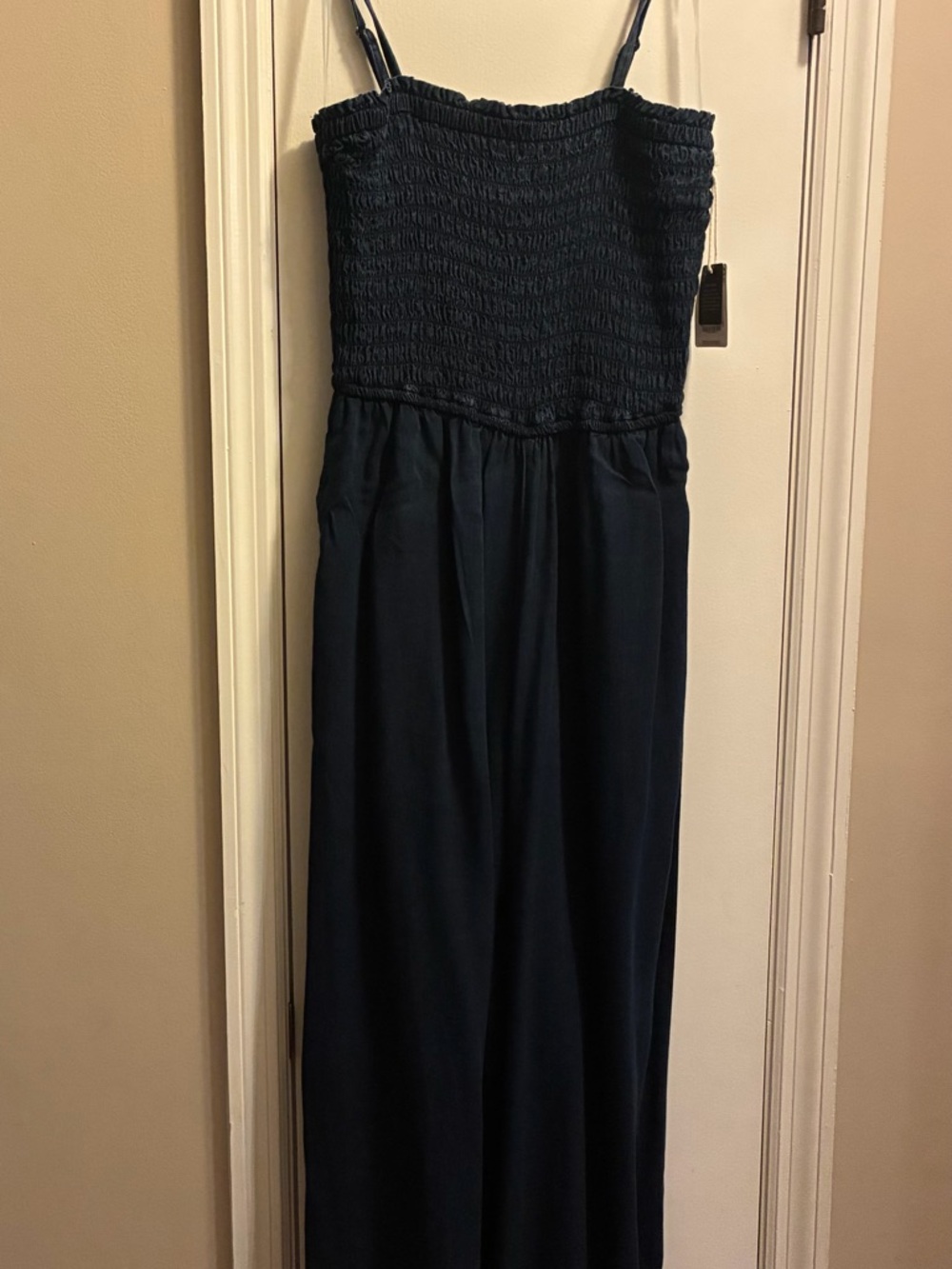 Smocked jumpsuit with pockets in Deep Navy